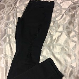 Express Mid Rise black distressed jegging